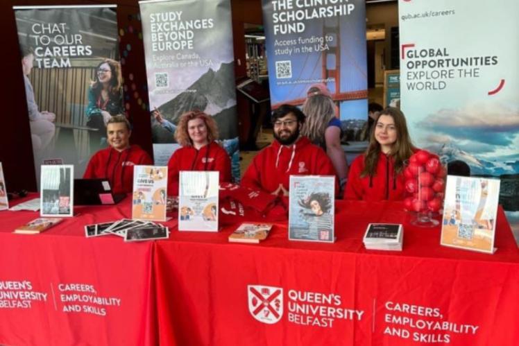 careers student ambassadors sitting in the foyer of one elmwood at a careers pop up